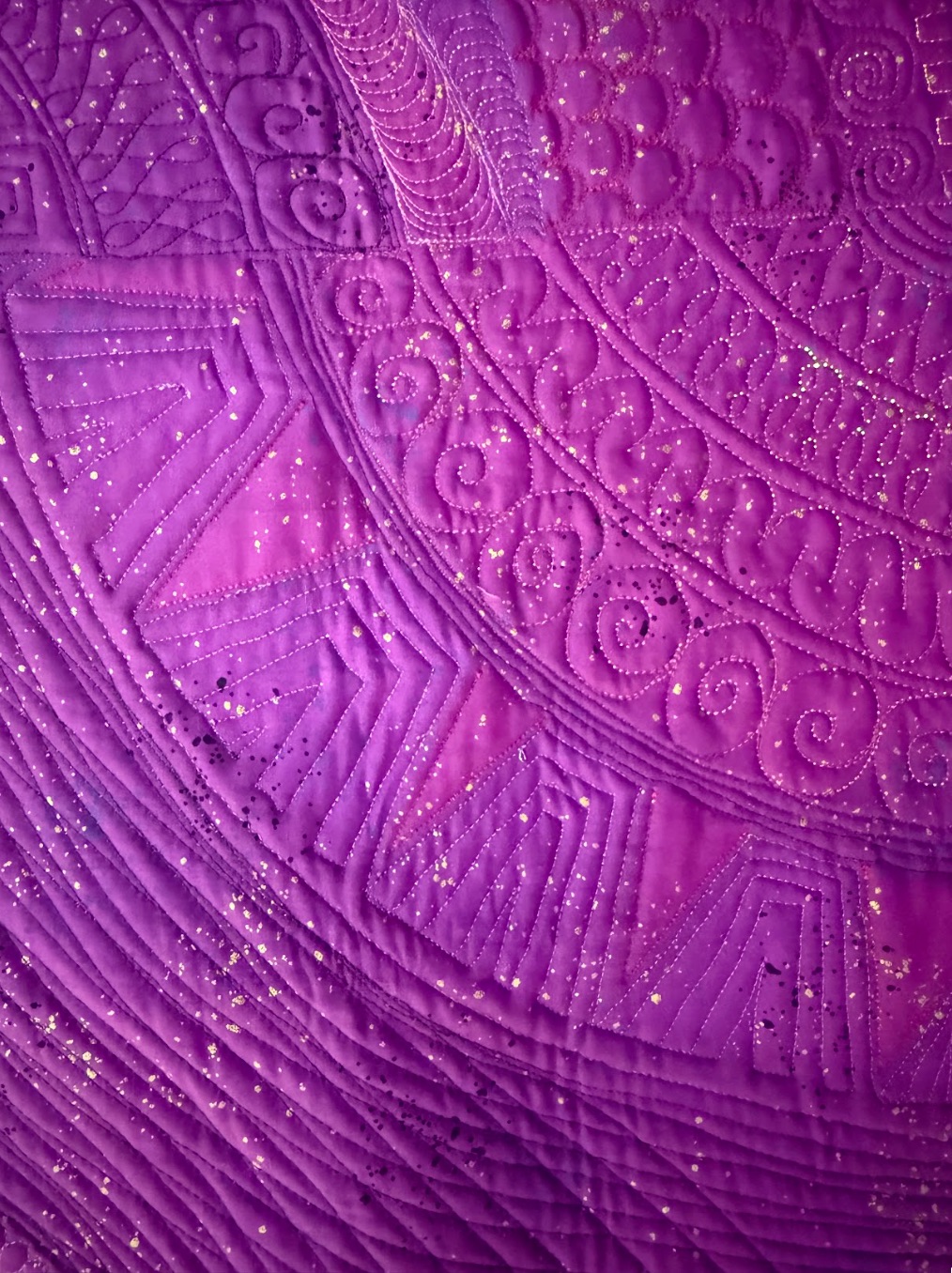 radiant-ripples-nina-clotfelter-back-of-quilt-detail-1.jpg